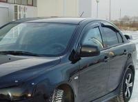 Дефлекторы боковых окон Mitsubishi Lanser SD (2007-) (4шт.) (темн)