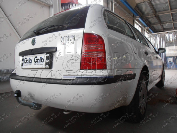 фото Фаркоп Galia с оцинкованным шаром для Skoda Octavia I седан/универсал 1998-2004, Octavia Tour 2004-2010, съемный, без подрезки, нагрузка 1600 кг